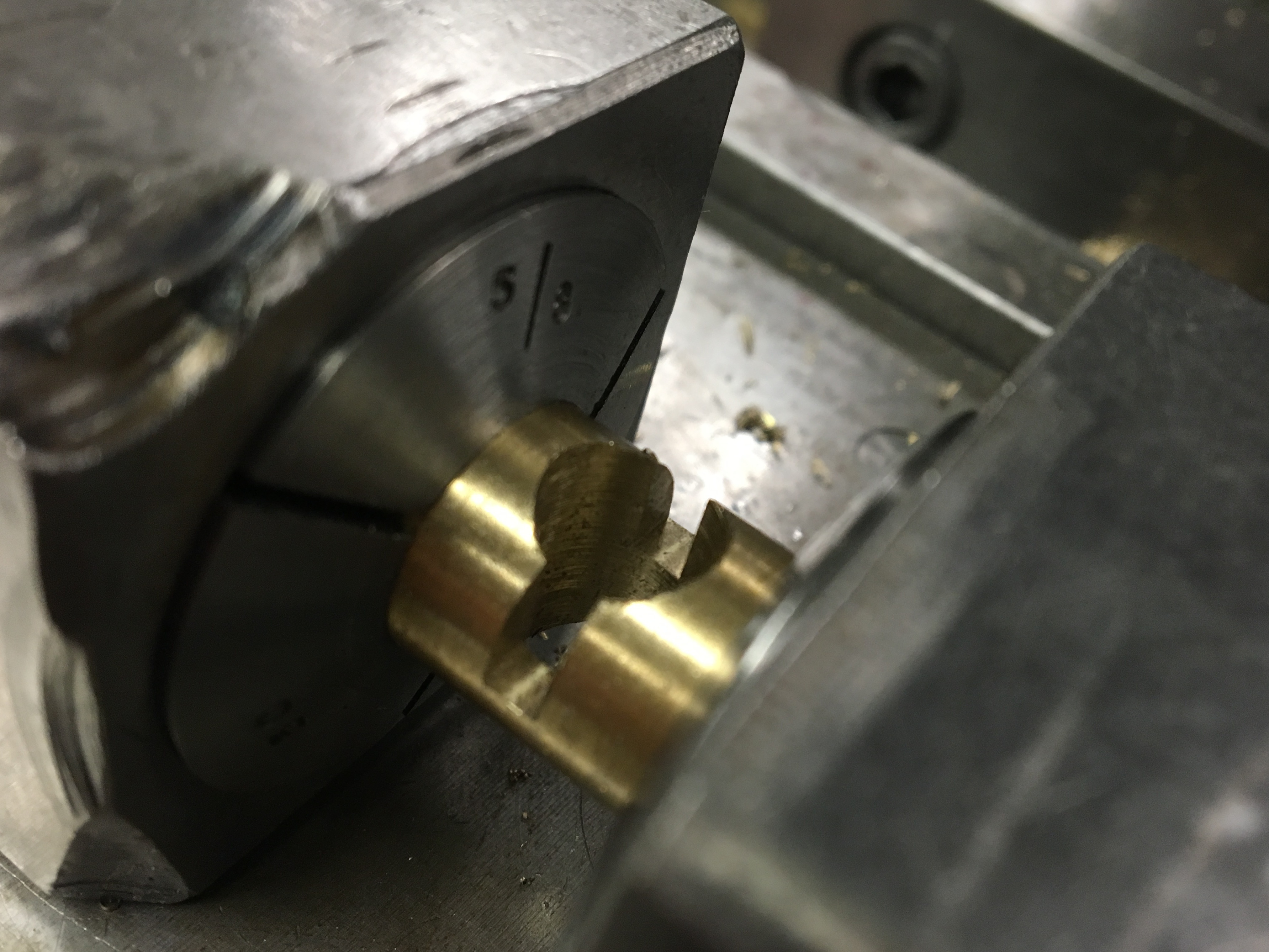 Minimal clearance for drilling axle hole and milling locking slot