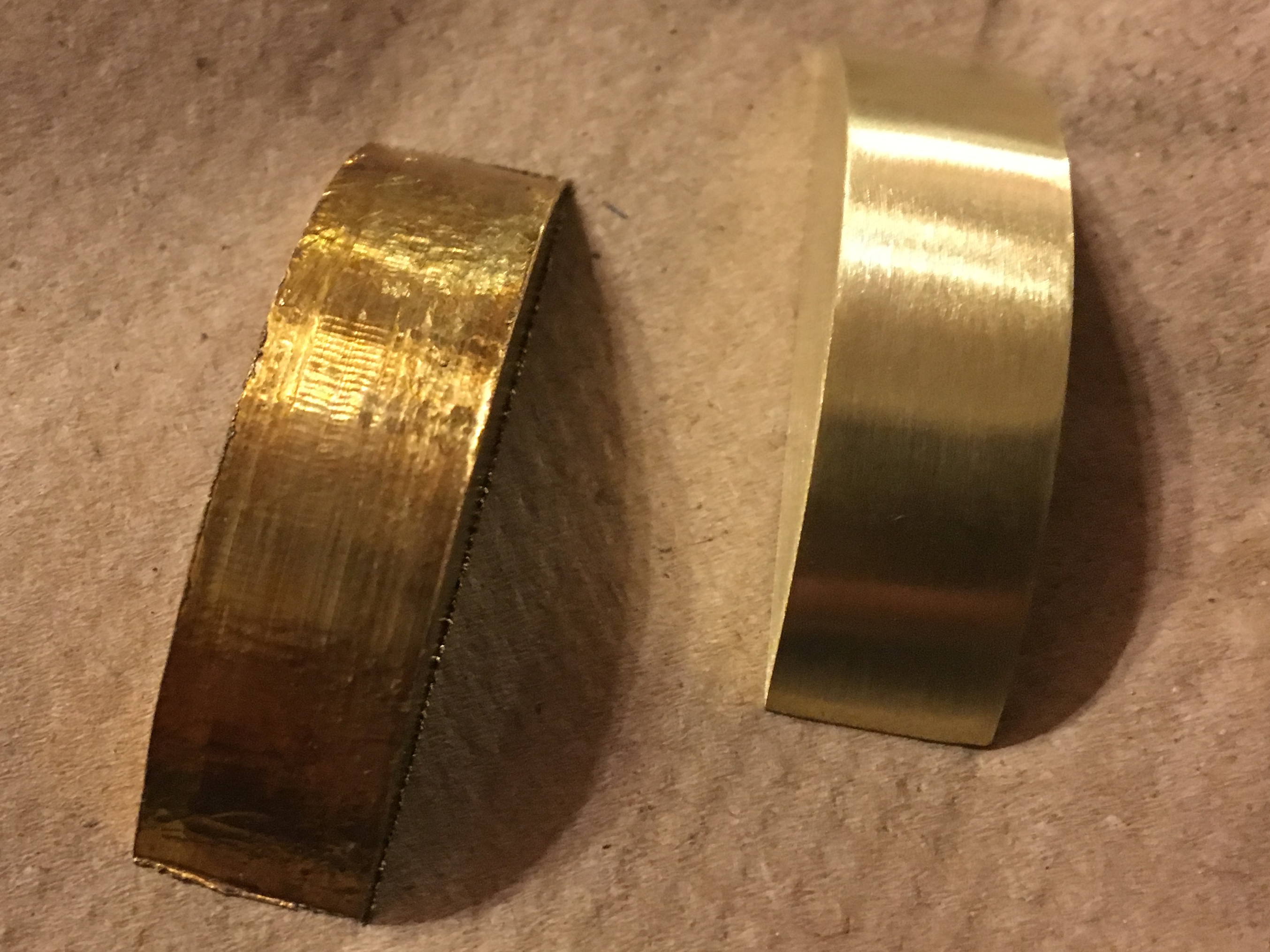 Before and after sanding brass insets